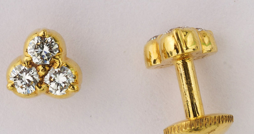 Three Circular Stone Diamond Studs