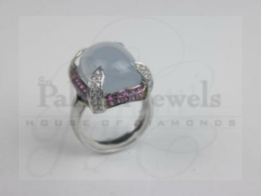 Classy Blue Surround Diamond Ring