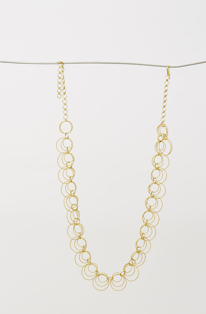 Delicate Circular Beaten Gold Necklace